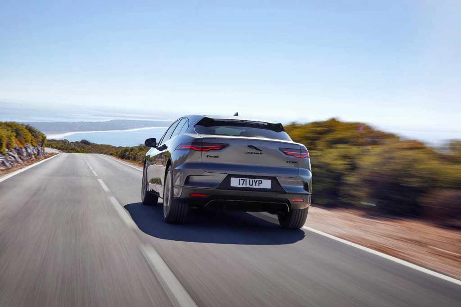 Jaguar I-Pace electric car exterior rear driving